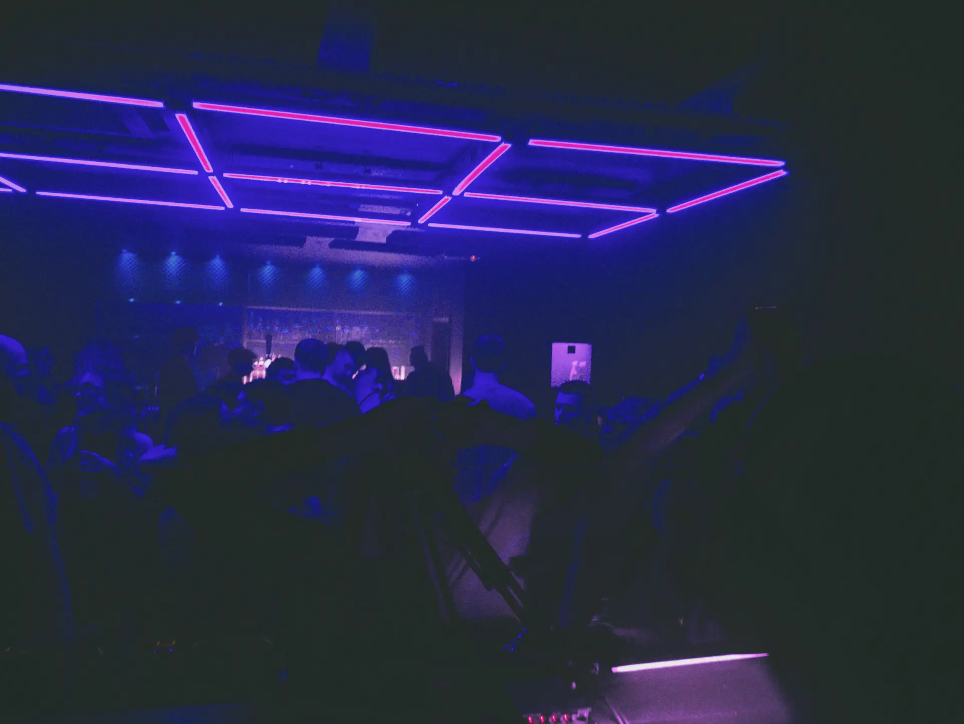 Packed dancefloor at Bluebox York drenched in deep blue light